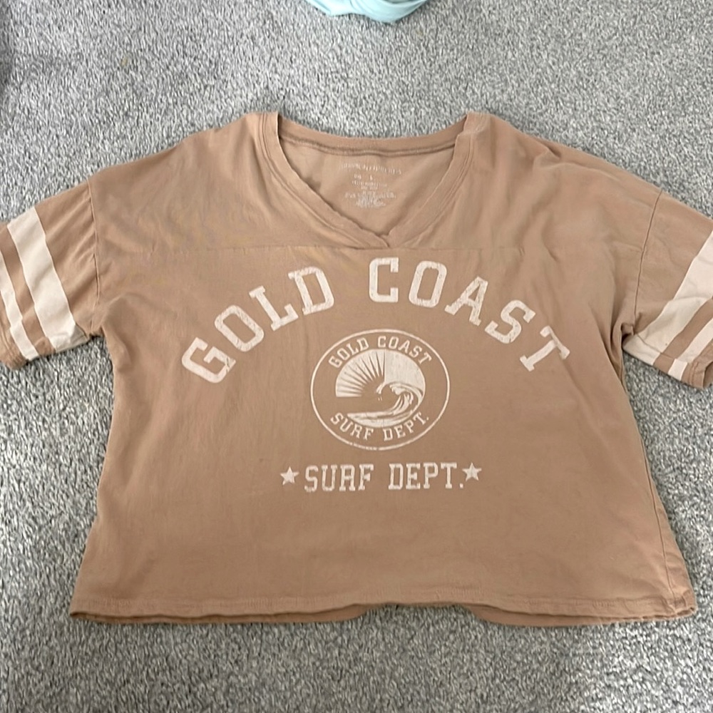 grayson threads shirt, tan in color, size large but fits as a medium